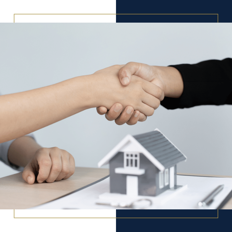 property manager shaking hands with new tenant.